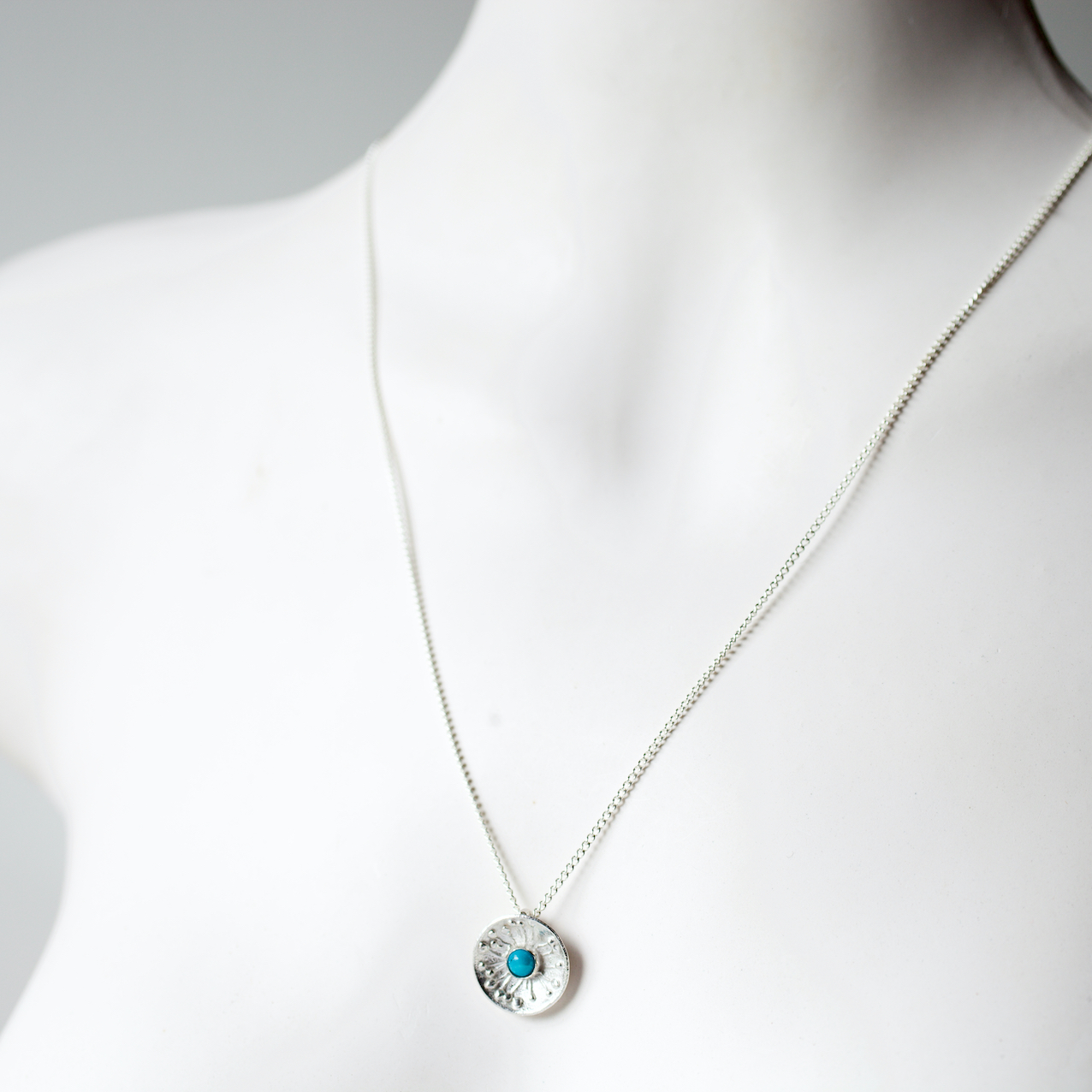 turquoise hawthorn blossom pendant 18mm diameter on 18" silver chain