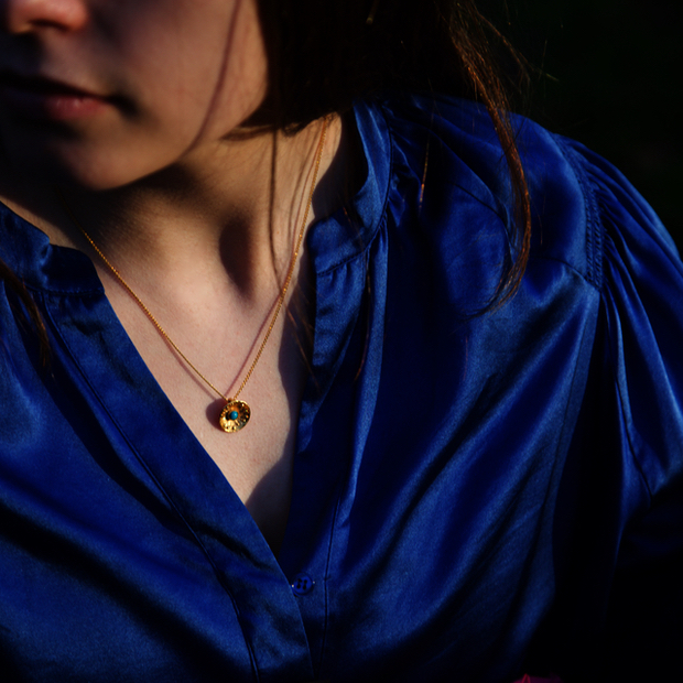 TURQUOISE HAWTHORN BLOSSOM PENDANT WORN ON MODEL
